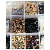 Assorted beads in various shapes, sizes and materi
