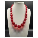 Necklace with graduated beads.