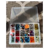 Assorted beads in various shapes, sizes and materi