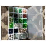 Assorted beads in various shapes, sizes and materi