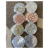 jewelry making supplies featuring various charms,
