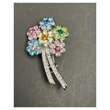 multi colored bouquet of flowers pin/brooch
