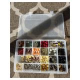 Assorted beads in various shapes, sizes and materi