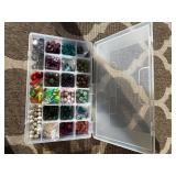 Assorted beads in various shapes, sizes and materi