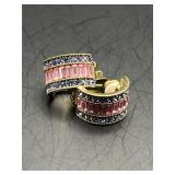 Marked HEIDI DAUS China clip on earrings