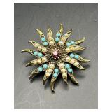 vintage starburst brooch