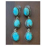 Handcrafted dangle earrings.