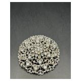 Vintage circular, ornate design brooch pin.