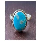 Marked sterling turquoise ring.