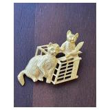 Marked LIA brooch pin. Cats and flying bird.