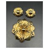 Vintage gold-tone floral brooch and earring set.