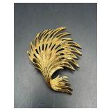 Vintage gold tone Monet brooch pin