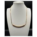 Trifari necklace with clear and red rhinestone