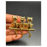 three cats sitting on a branch brooch pin