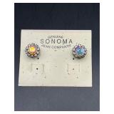 Sonoma Jean Company and feature iridescent  studs.