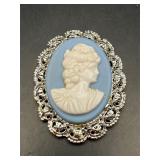 Vintage white and blue cameo brooch pin.