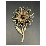 Vintage flower brooch pin. Black rhinestones.