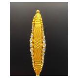 Vintage gold tone stick pin with rhinestone.