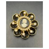 Vintage Coro Pegasus cameo brooch pin.