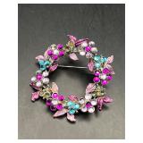 Colorful rhinestones flower brooch pin.
