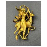 Vintage gold tone brooch pin. Animal and lady.