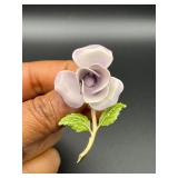 Light purple flower brooch pin.