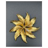 Vintage large gold tone flower brooch pin.