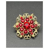 Vintage brooch pin. Red rhinestones.