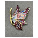 brooch features vibrant purple and blue enamel