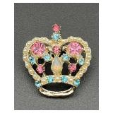 vintage crown brooch features pink and blue