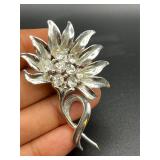 Flower brooch pin.