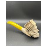 Vintage or antique smoke tobacco pipe.