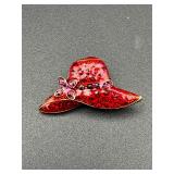 Red hat brooch pin pendant.