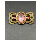 Brooch pin.