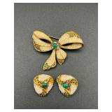 Vintage marked BSK brooch clip on earrings set.