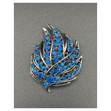 Vintage blue rhinestones brooch pin.
