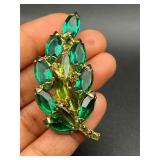 Vintage shades of green rhinestones brooch pin.