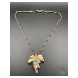Vintage necklace leaf design accented blue rhinest