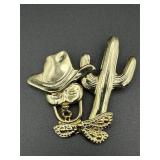 gold-tone brooch cowboy hat and bandana & cactus.