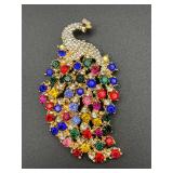 Colorful rhinestones modern peacock brooch pin.