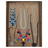 Jewelry tray. Assortment of jewelry pieces.