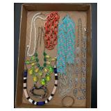 Jewelry tray. Assortment of jewelry pieces.