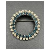 Vintage rhinestone circle brooch pin.