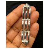 Vintage silver tone Monet bar style brooch pin.