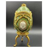 Ornate vintage green musical egg