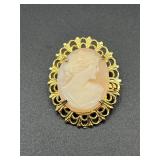 Vintage gold tone cameo brooch pin.