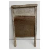 Antique wooden washboard, corrugated metal
