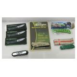 Pocket knives, some with key chain loops,