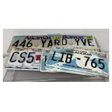 9 license plates, Arkansas, Oklahoma, Missouri