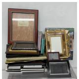 Picture frames of various sizes, photo albums